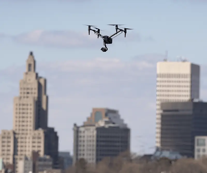 two rhode island drone operators working for sean mcveigh media assessing the perfect time to fly a drone outside